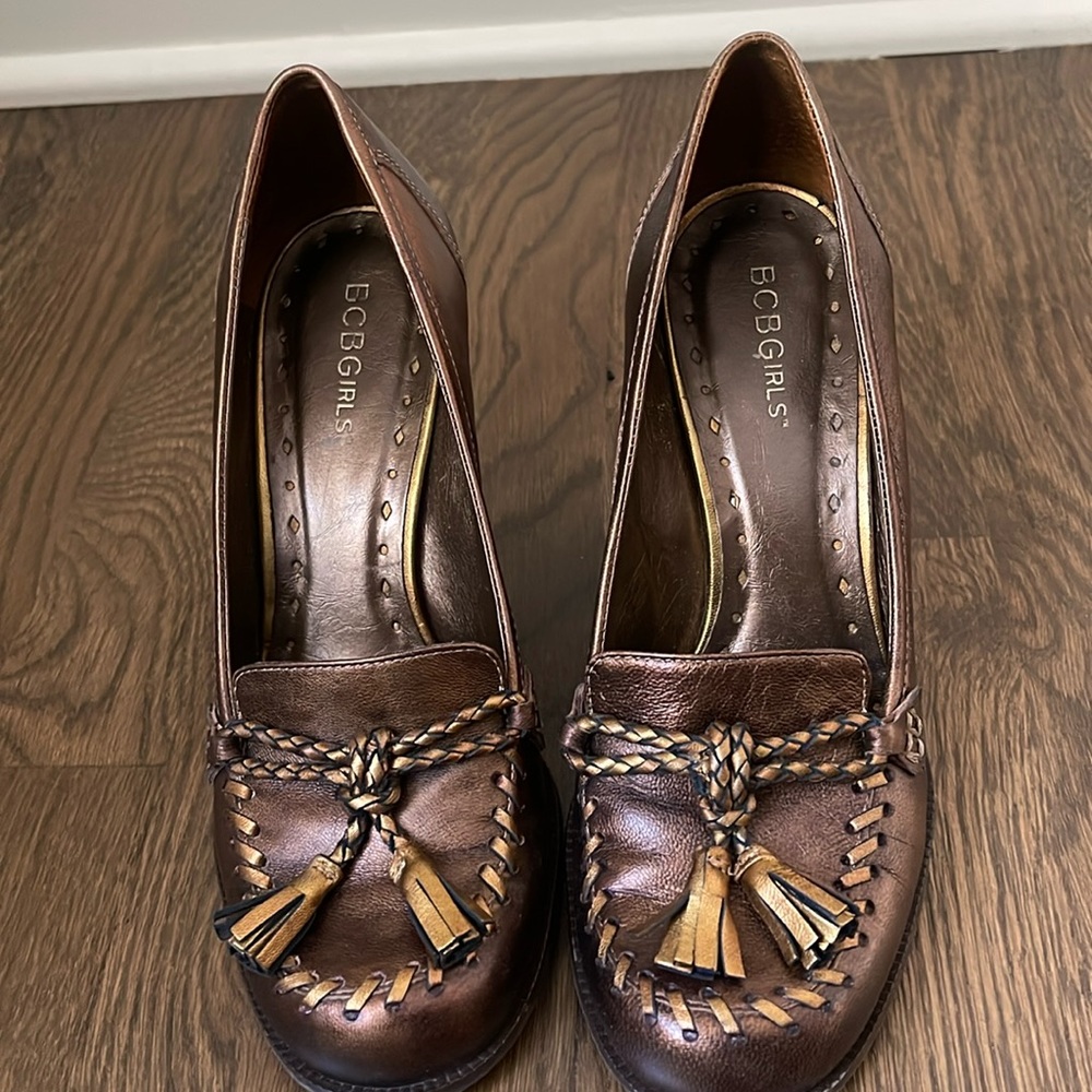 BCBGirls Bronze/Old Gold leather with tassels on top of the foot 3 inch wedge